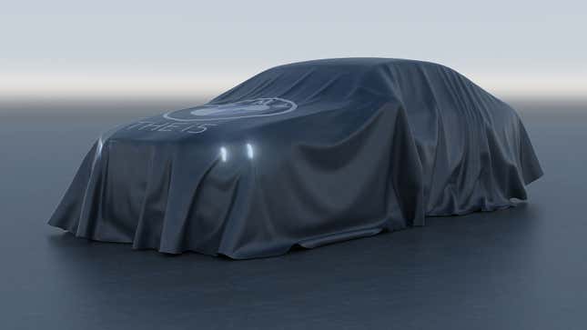 An image of a BMW sedan covered in a sheet. 