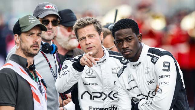 A photo of Brad Pitt and Damson Idris on set of the F1 movie. 