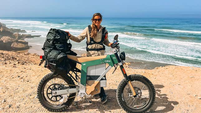 A photo of Sinje Gottwald and her Cake Kalk electric motorcycle. 
