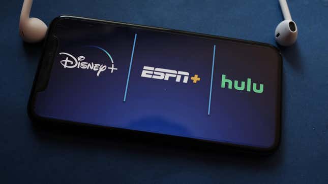 Disney+, Hulu, and ESPN+ logos on phone screen