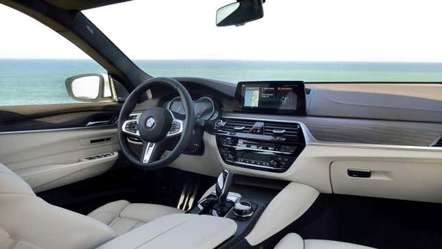 The interior of a BMW sedan. 