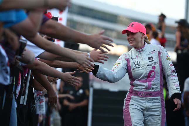 Pippa Mann greets fans during driver introductions, 2015