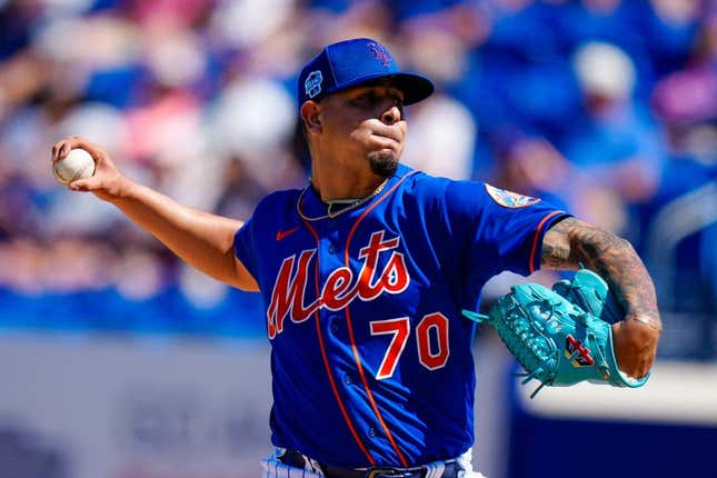 Mar 2, 2023; Port St. Lucie, Florida, USA; New York Mets starting pitcher Jose Butto (70) throws a pitch against the Atlanta Braves during the third inning at Clover Park.