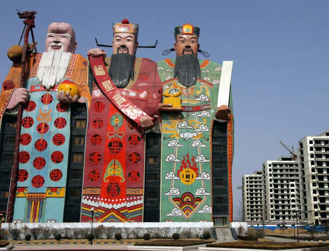 The Beijing Tianzi Hotel was ranked China’s ugliest building for 2012. The three men depict Chinese gods and symbols of prosperity, happiness, and career achievement.