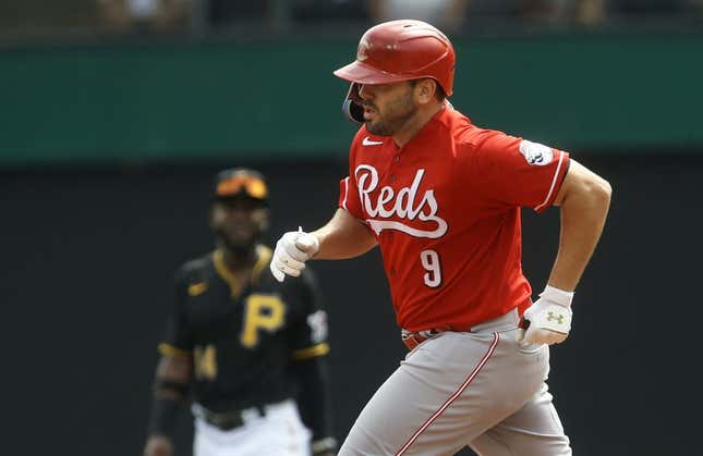 Aug 21, 2022; Pittsburgh, Pennsylvania, USA; Cincinnati Reds first baseman Mike Moustakas (9) rounds the bases after hitting a two run home run against the Pittsburgh Pirates during the third inning at PNC Park.