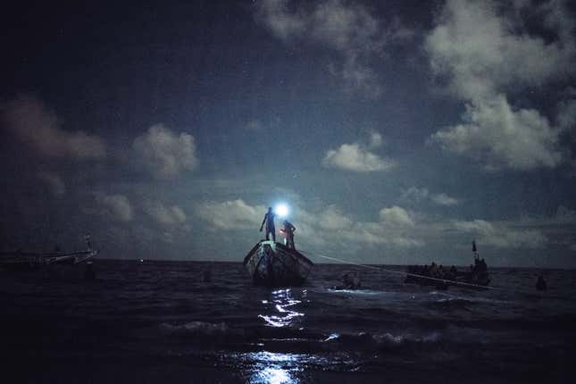 After a whole night out at sea, artisanal fisherman return to Senegal’s largest fishing port, Joal Fadiouth.