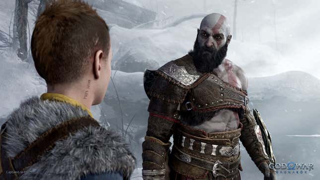 Kratos, wide-eyed, staring intently at his son, Atreus.