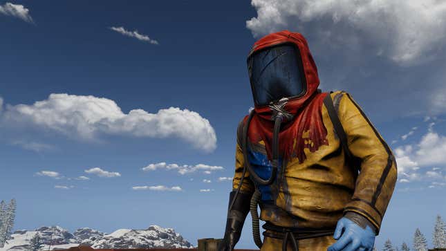 A character in Rust wears a hazmat suit and stands in front of a blue sky dotted with clouds.
