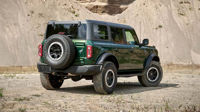 Ford Bronco four-door in green rear quarter view