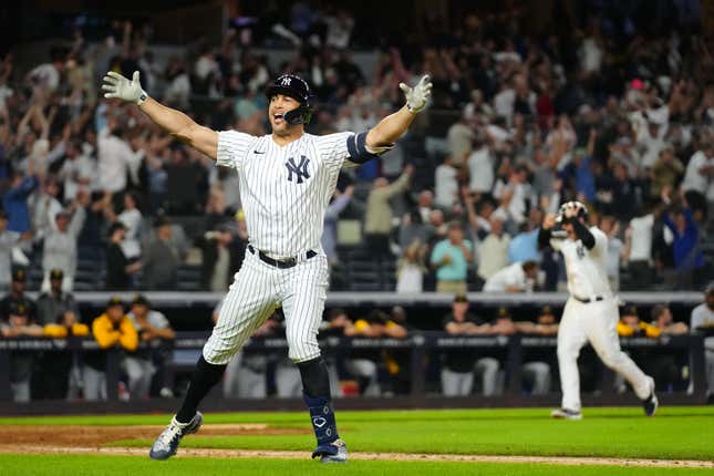 New York Yankees OF/DH Giancarlo Stanton celebrates a walk-off grand slam