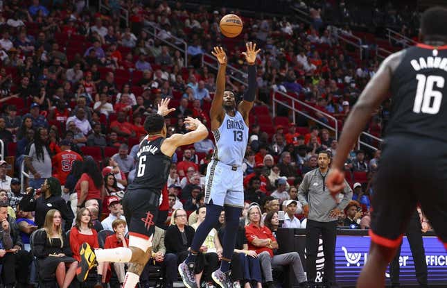 Mar 1, 2023; Houston, Texas, USA; Memphis Grizzlies forward Jaren Jackson Jr. (13) shoots the ball as Houston Rockets forward KJ Martin (6) defends during the second quarter at Toyota Center.