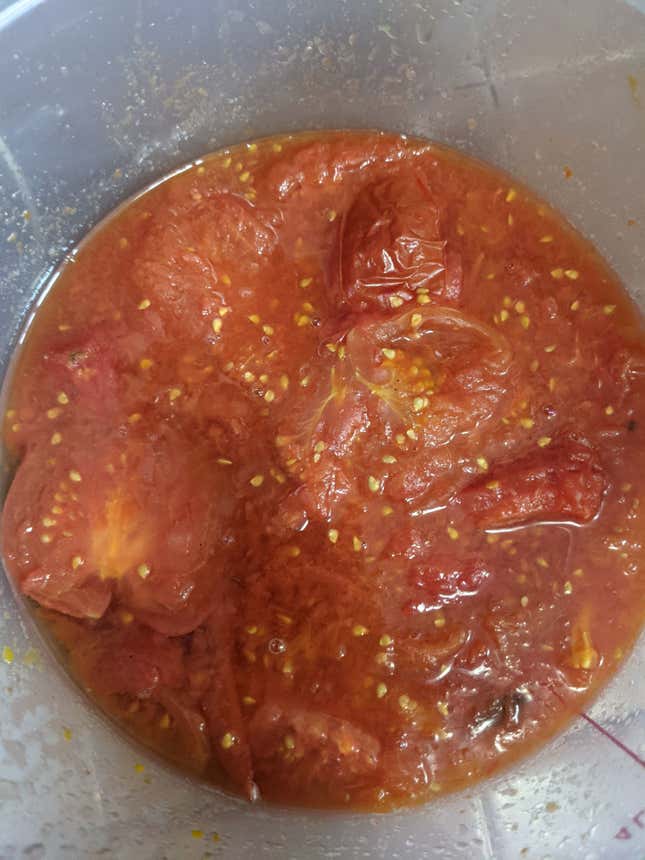 Roasted and peeled tomatoes cooling