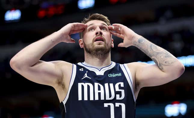 Feb 26, 2023; Dallas, Texas, USA; Dallas Mavericks guard Luka Doncic (77) reacts during the fourth quarter against the Los Angeles Lakers at American Airlines Center.