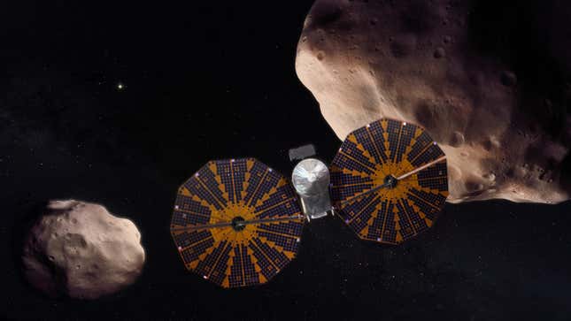 Artist’s conception of the Lucy spacecraft visiting Jupiter’s trojan asteroids. 