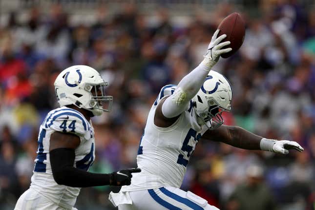 BALTIMORE, MARYLAND - SEPTEMBER 24: Kwity Paye #51 of the Indianapolis Colts celebrates with Zaire Franklin #44 after recovering a fumble in the second quarter of a game against the Baltimore Ravens at M&amp;T Bank Stadium on September 24, 2023 in Baltimore, Maryland. (Photo by Rob Carr/Getty Images)