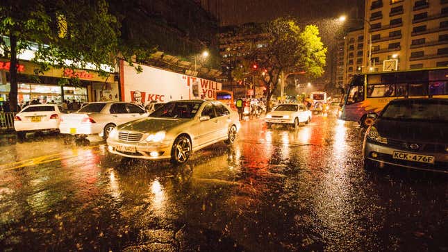 A Mercedes Benz stuck in traffic in downtown Nairobi.