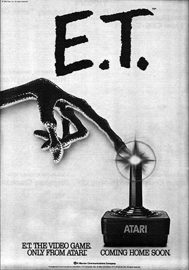 An ad for Atari's then-upcoming E.T. video game show's an alien hand touching an Atari joystick with an elongated finger.