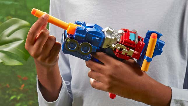 The Hasbro The Transformers: Rise of the Beasts 2-in-1 Optimus Prime Blaster demonstrated in blaster mode.