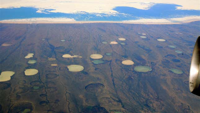 Ponds of melted water in Canada's permafrost.