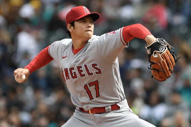 Apr 5, 2023; Seattle, Washington, USA; Los Angeles Angels starting pitcher Shohei Ohtani (17) throws a pitch against the Seattle Mariners during the third inning at T-Mobile Park.