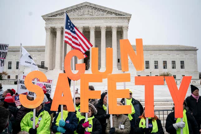 Gun safety advocates rally in front of the U.S. Supreme Court during oral arguments in the Second Amendment case N.Y. State Rifle &amp; Pistol v. the City of New York, NY on December 2, 2019, in Washington, DC. 