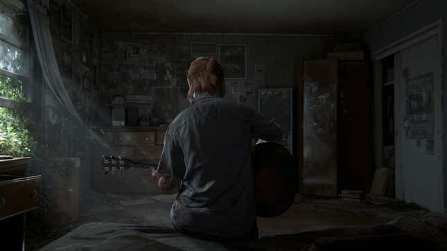 Ellie plays guitar in an abanodned room with her back to the camera.