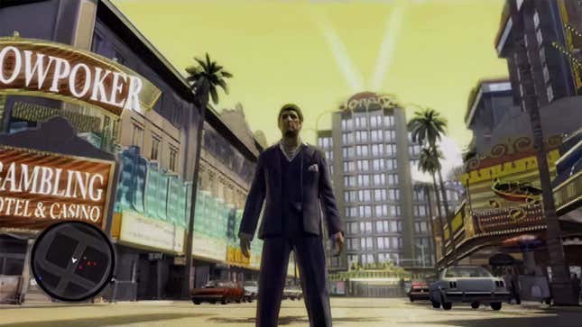 Tony Montana stands in the middle of a Las Vegas street during the day. 