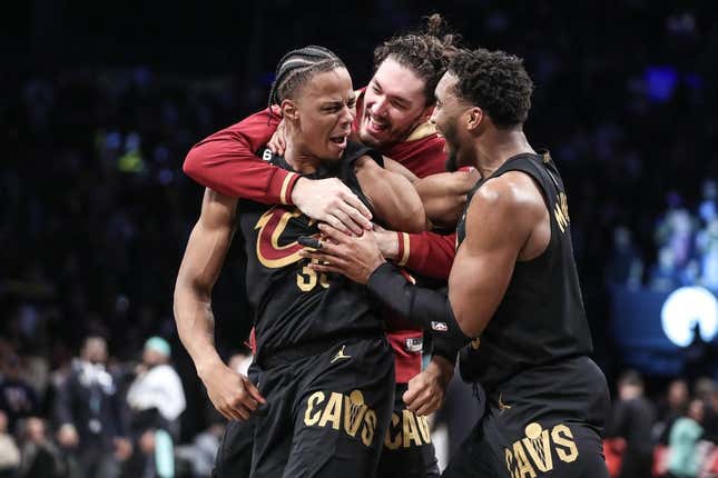 Mar 23, 2023; Brooklyn, New York, USA;  Cleveland Cavaliers forward Isaac Okoro (35) celebrates with his teammates after scoring the game wining basket to beat the Brooklyn Nets 116-114 at Barclays Center.