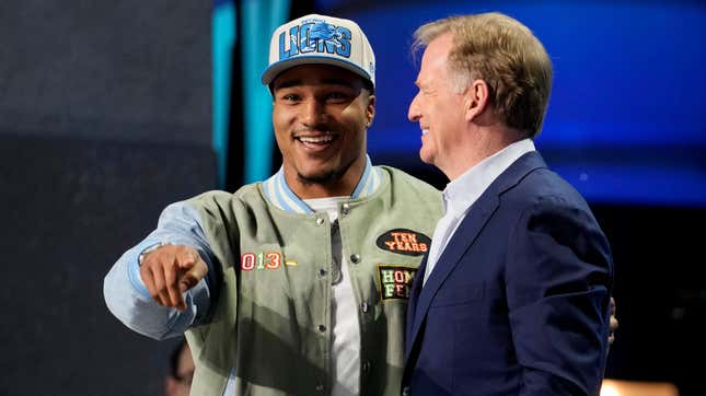 Detroit Lions second-round pick Brian Branch with Roger Goodell