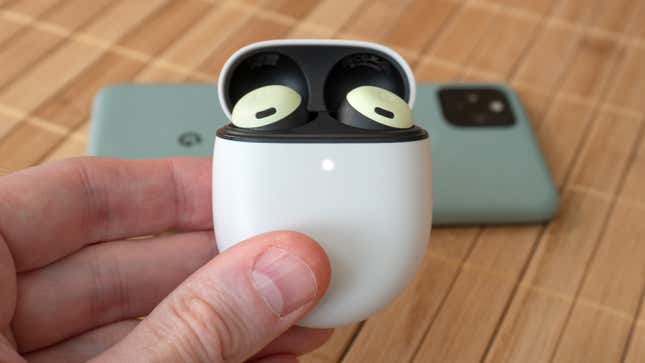 The Google Pixel Buds Pro inside their egg-shaped charging case.