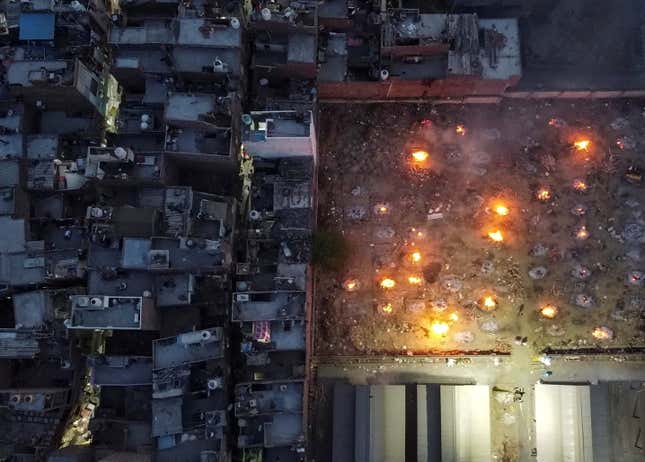 A mass cremation of victims who died due to the coronavirus disease (COVID-19), is seen at a crematorium ground in New Delhi, India, April 22, 2021. Picture taken with a drone.