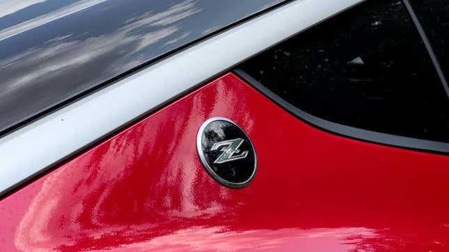 Emblem close-up image of red 2023 Nissan Z
