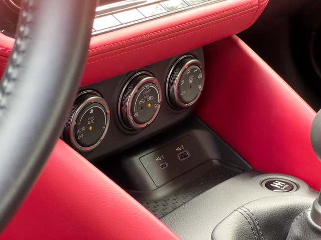 Climate dials close-up image of red 2023 Nissan Z