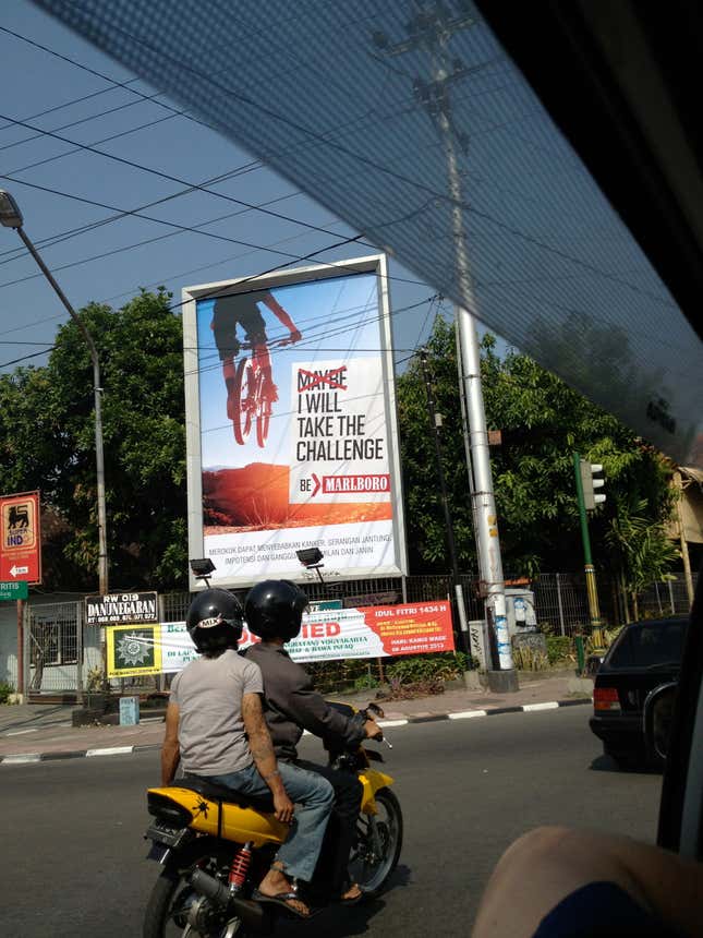 A billboard advertising cigarettes in Jakarta.