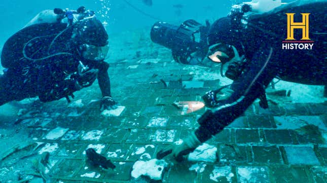 Divers with a recent film crew over wreckage identified as part of Challenger.