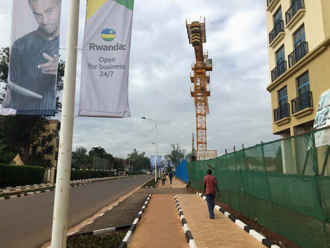 A man walks along a street in the Rwanda’s capital Kigali.