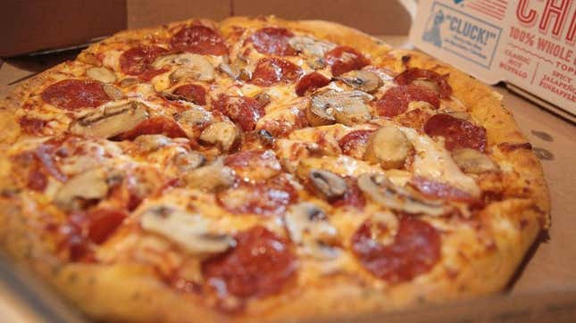 Domino's pizza in cardboard box
