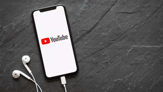 Youtube screen on an iPhone, with earbuds. 