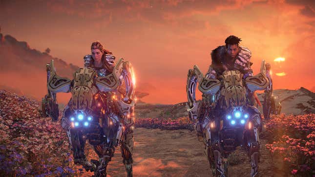 Aloy and Varl ride toward the camera on the backs of robotic animals.