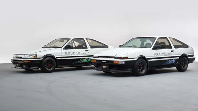 Front-quarter image of the AE86 EV and H2 concepts side by side.