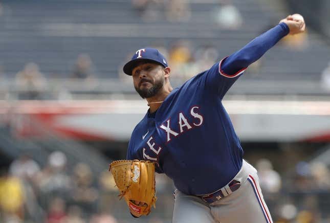 May 24, 2023; Pittsburgh, Pennsylvania, USA; Texas Rangers starting pitcher Martin Perez (54) delivers a pitch against the Pittsburgh Pirates during the first inning at PNC Park.