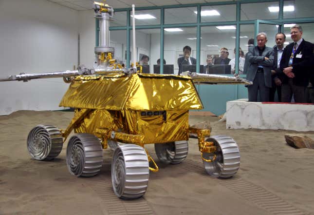 Scientists from the UK observe a prototype of the lunar rover in 2007.