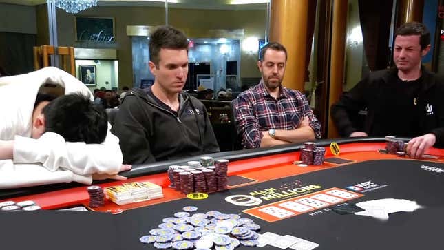 A screenshot shows a group of men playing poker together. 