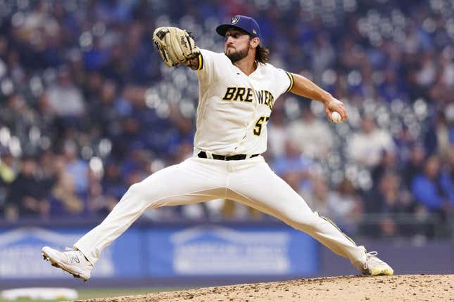 May 8, 2023; Milwaukee, Wisconsin, USA;  Milwaukee Brewers pitcher Bennett Sousa (57) throws a pitch during the eighth inning against the Los Angeles Dodgers at American Family Field.