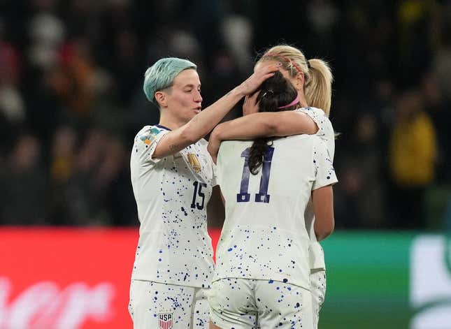 Aug 6, 2023; Melbourne, AUS; United States forward Megan Rapinoe (15) and midfielder Lindsey Horan (10) console forward Sophia Smith (11) after losing to Sweden in the penalty kick shootout during a Round of 16 match in the 2023 FIFA Women&#39;s World Cup at Melbourne Rectangular Stadium.