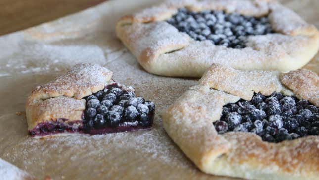 Blueberry galettes on parchment paper