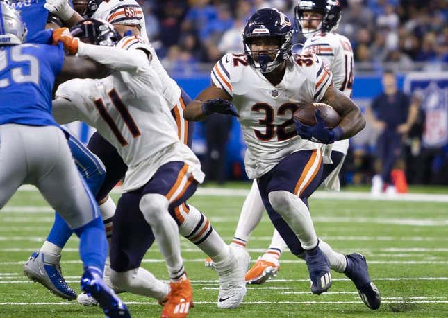 Nov 25, 2021; Detroit, Michigan, USA; Chicago Bears running back David Montgomery (32) runs the ball during the fourth quarter against the Detroit Lions at Ford Field.