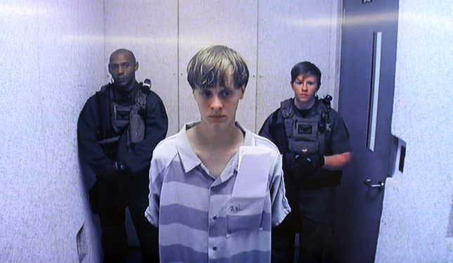 In this image from the video uplink from the detention center to the courtroom, Dylann Roof appears at Centralized Bond Hearing Court June 19, 2015 in North Charleston, South Carolina. Roof is charged with nine counts of murder and firearms charges in the shooting deaths at Emanuel African Methodist Episcopal Church in Charleston, South Carolina on June 17.