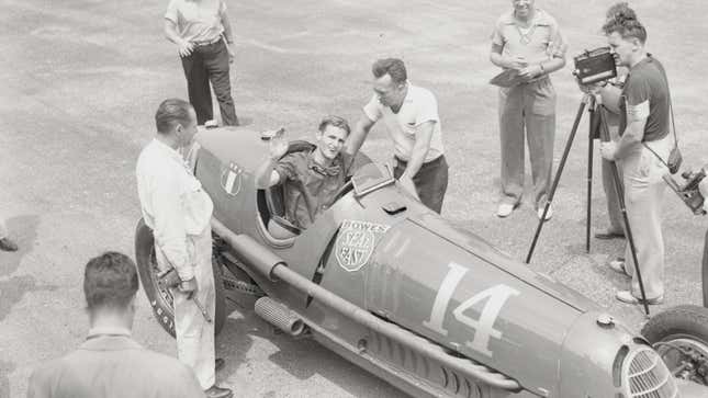 Rex Mays sitting in his car during 1937 Vanderbilt Cup