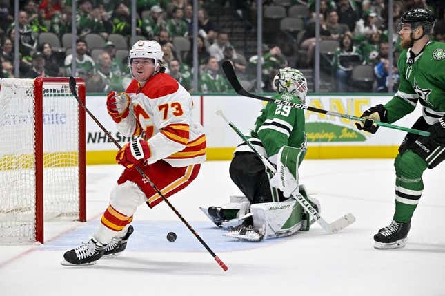 Mar 6, 2023; Dallas, Texas, USA; Calgary Flames right wing Tyler Toffoli (73) celebrates after he scores the game winning goal against Dallas Stars goaltender Jake Oettinger (29) during the third period at the American Airlines Center.